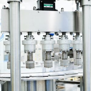 SPOUT POUCH MACHINE SEALING CAP